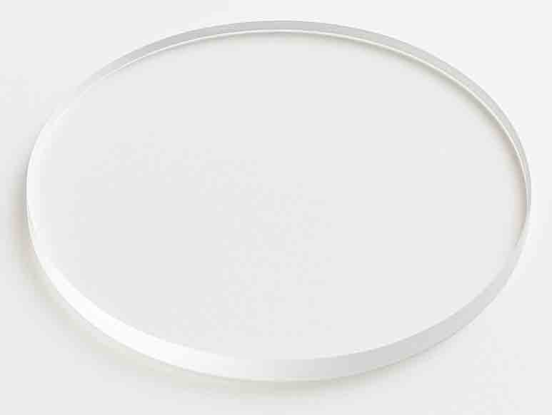 Polished 100mm quartz substrate with transparent, reflective surface on a white background