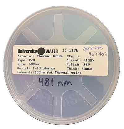 researcher uses substrate to test four point probe